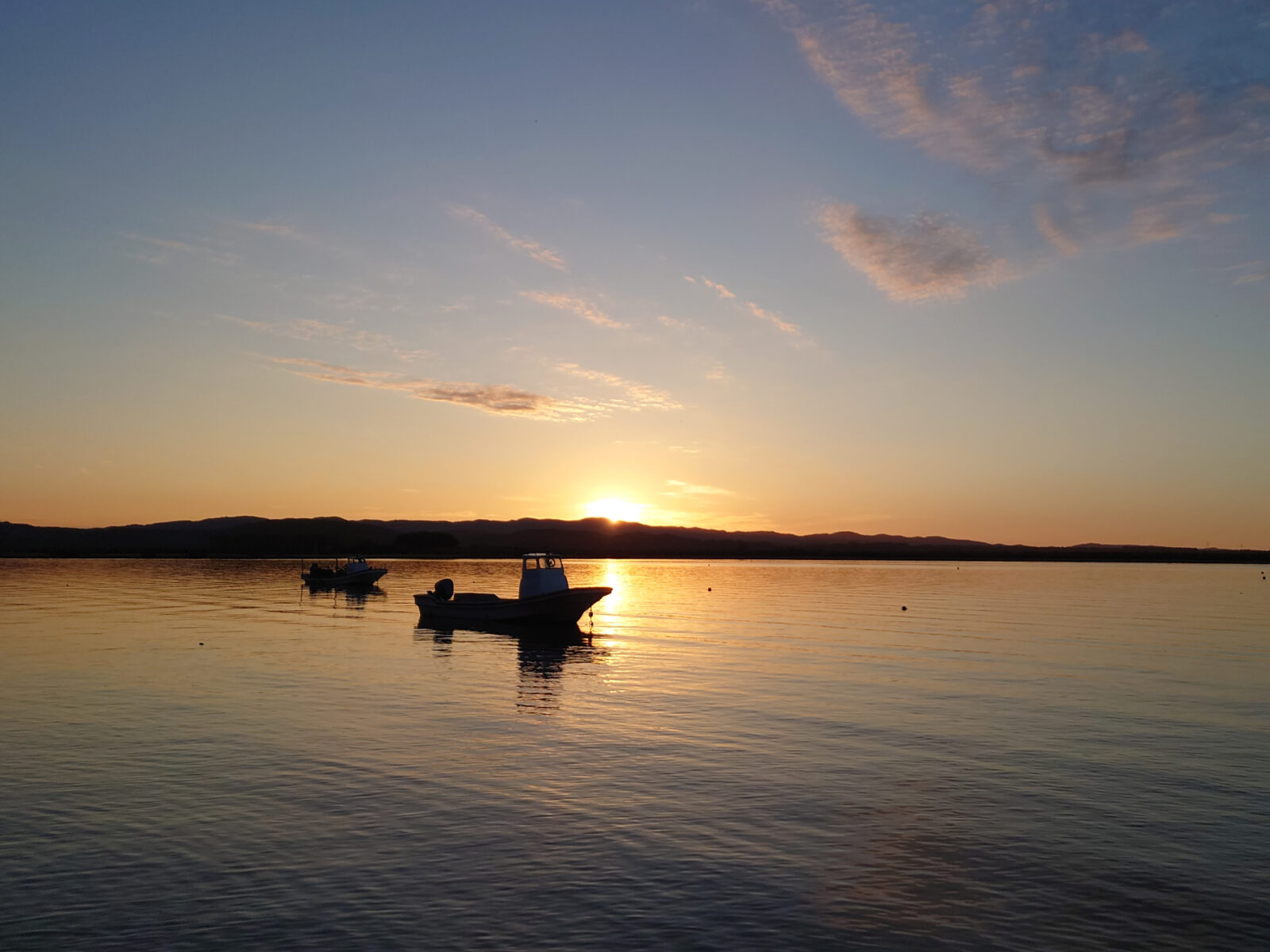 A beautiful sunset reflection on the lake surface.