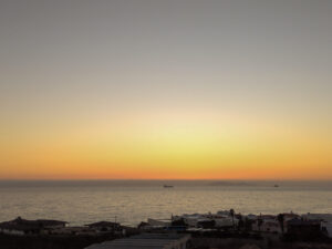 At a dawn, by the beach.